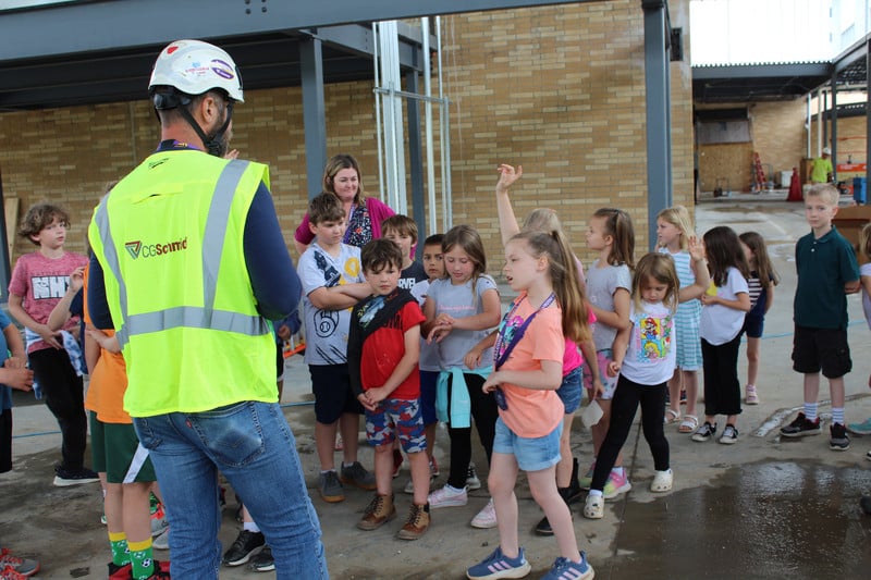 Photo of students touring inside the new school addition