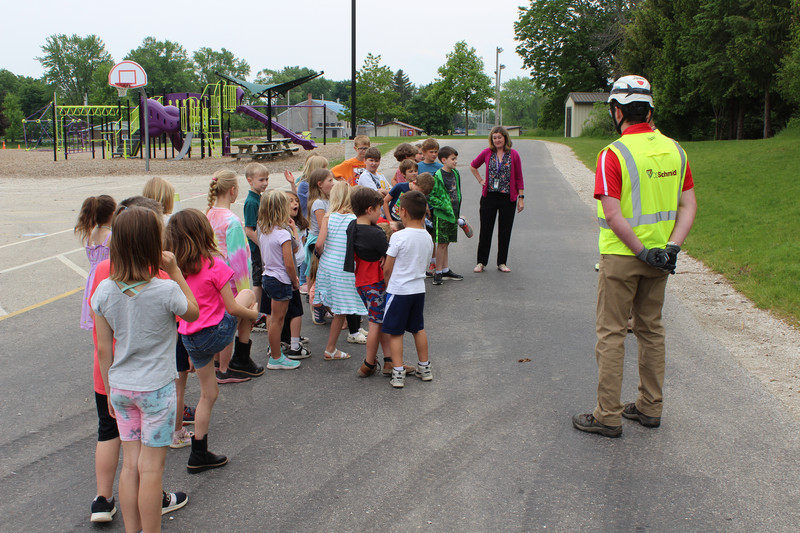 Photo of students outside the new school addition