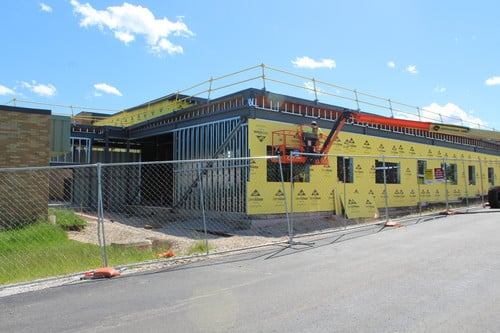 Exterior photo of school construction progress
