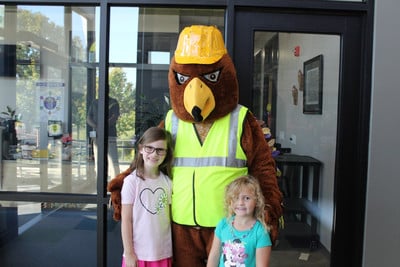 students with the school mascot